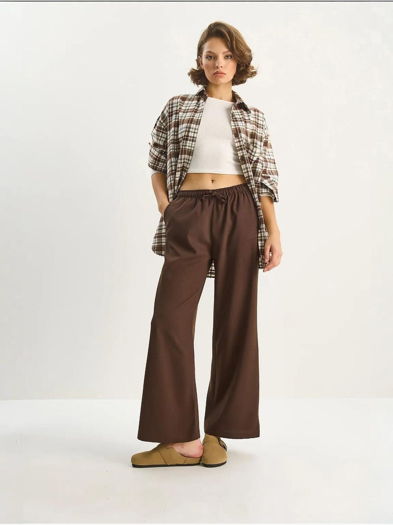 Pantalones palazzo de pierna ancha con cierre de lazo lucci Marrón oscuro - Kiabi