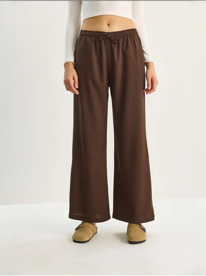 Pantalones palazzo de pierna ancha con cierre de lazo lucci Marrón oscuro - Kiabi
