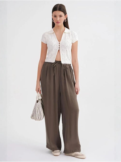 Pantalones palazzo plisados de cintura alta con cordón mixray - Kiabi Pantalones palazzo plisados de cintura alta con cordón mixray - Kiabi