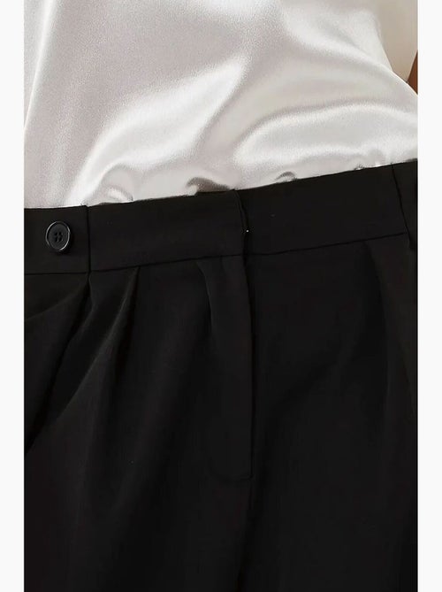 Pantalones palazzo plisados de cintura alta hiccup - Kiabi Pantalones palazzo plisados de cintura alta hiccup - Kiabi