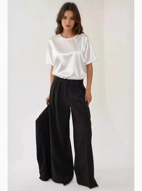 Pantalones palazzo plisados de cintura alta hiccup - Kiabi Pantalones palazzo plisados de cintura alta hiccup - Kiabi