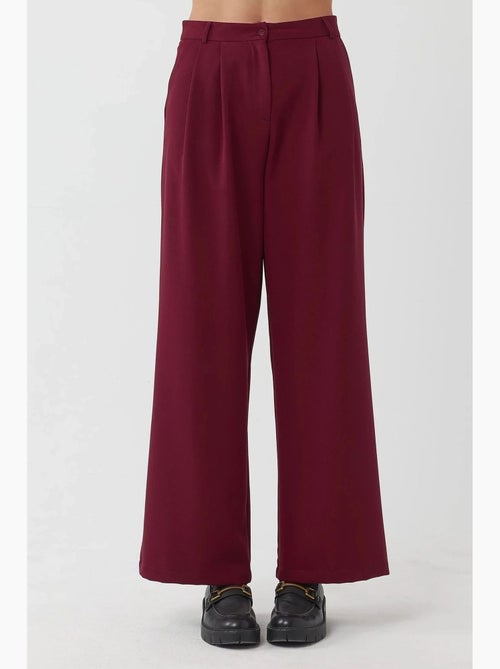 Pantalones palazzo plisados de cintura alta hiccup - Kiabi Pantalones palazzo plisados de cintura alta hiccup - Kiabi