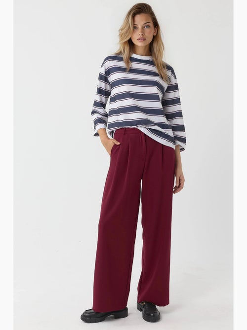 Pantalones palazzo plisados de cintura alta hiccup - Kiabi Pantalones palazzo plisados de cintura alta hiccup - Kiabi
