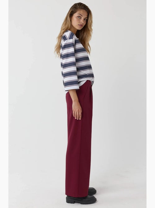Pantalones palazzo plisados de cintura alta hiccup - Kiabi Pantalones palazzo plisados de cintura alta hiccup - Kiabi