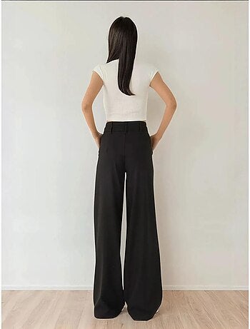 Pantalones palazzo plisados de cintura alta