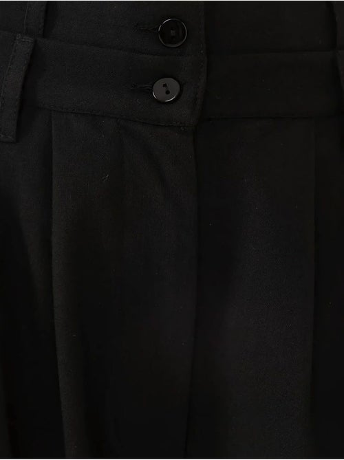 Pantalones palazzo plisados de cintura alta - Kiabi Pantalones palazzo plisados de cintura alta - Kiabi
