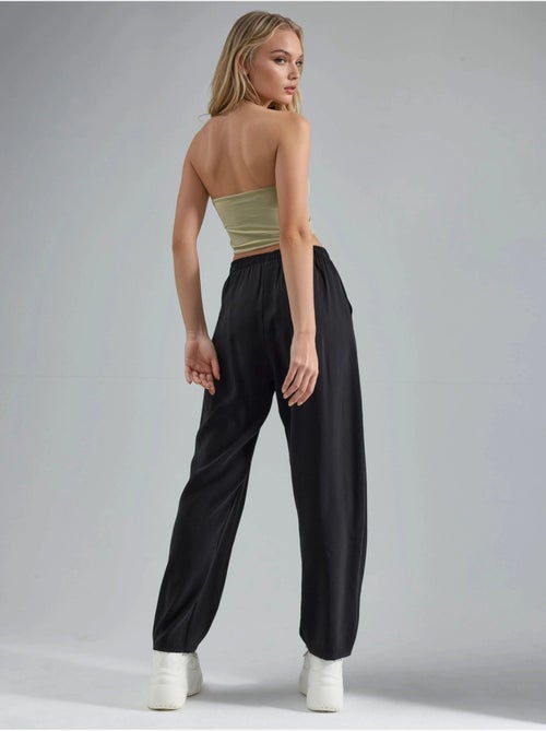Pantalones plisados de pierna ancha busem - Kiabi Pantalones plisados de pierna ancha busem - Kiabi