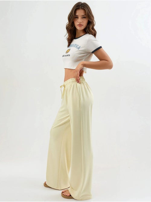 Pantalones rectos con cintura elástica busem - Kiabi Pantalones rectos con cintura elástica busem - Kiabi