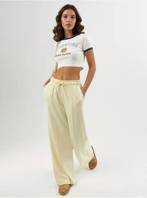 Pantalones rectos con cintura elástica busem - Kiabi Pantalones rectos con cintura elástica busem - Kiabi