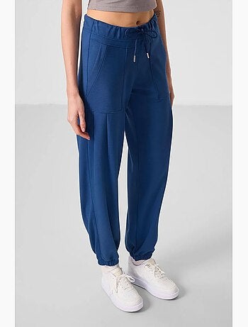 Pantalones relaxed de crepé de tiro medio con bolsillo tommy
