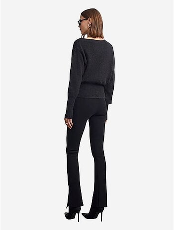 Pantalones skinny acampanados con cinturón