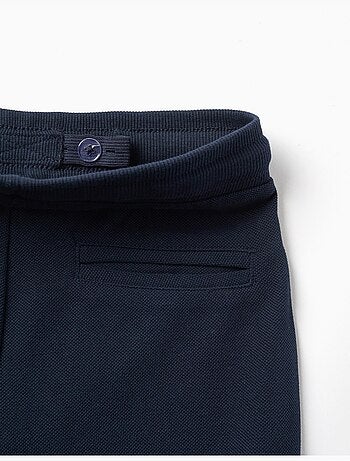 Pantalones slim de piqué de algodón con cordón