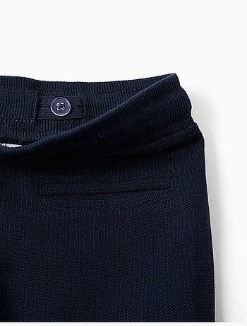 Pantalones slim de piqué de algodón con cordón