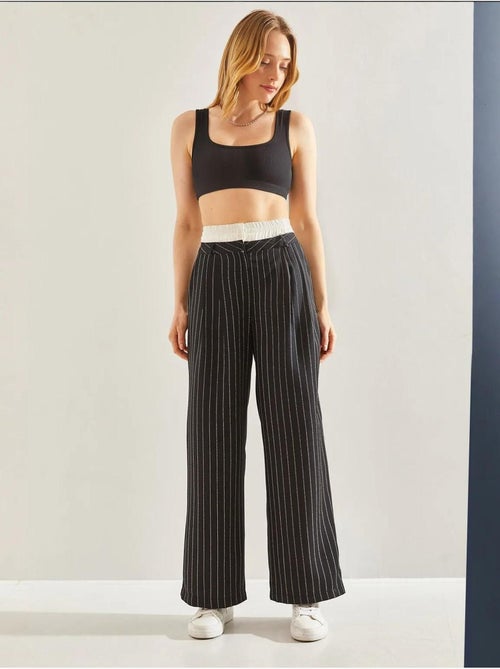 Pantalones tejidos a rayas con detalle en la cintura en contraste lucci - Kiabi Pantalones tejidos a rayas con detalle en la cintura en contraste lucci - Kiabi