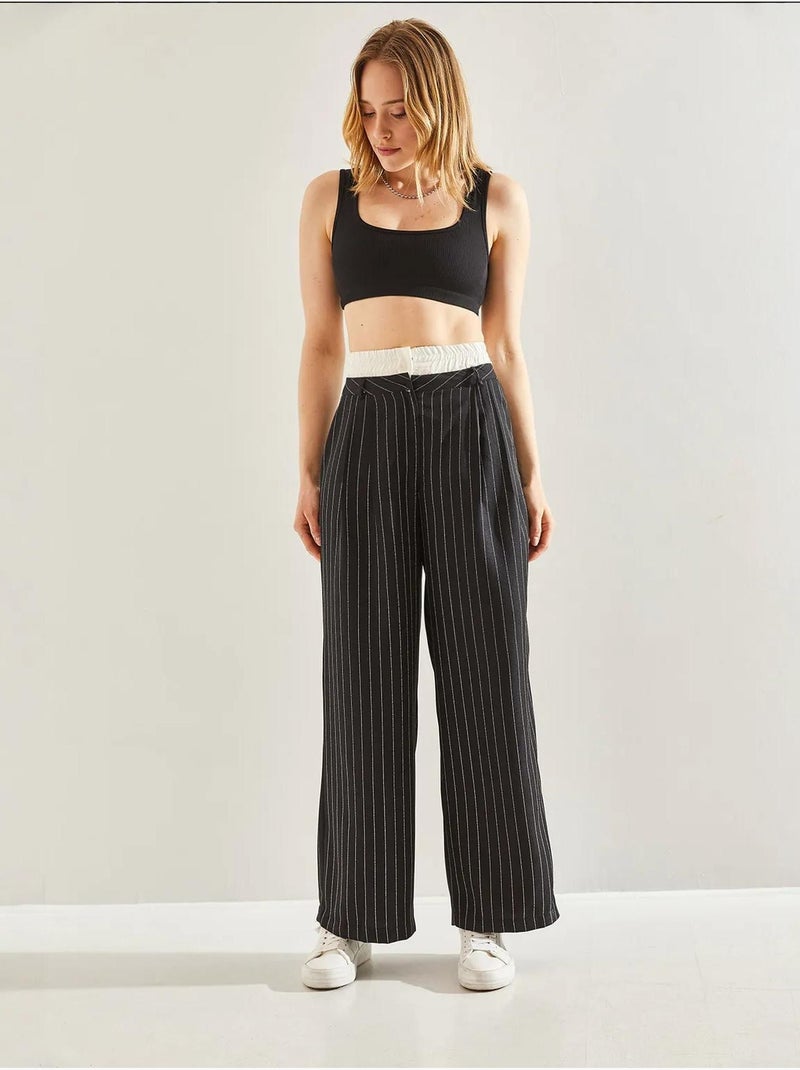 Pantalones tejidos a rayas con detalle en la cintura en contraste lucci Negro - Kiabi