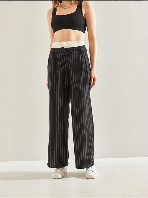 Pantalones tejidos a rayas con detalle en la cintura en contraste lucci - Kiabi Pantalones tejidos a rayas con detalle en la cintura en contraste lucci - Kiabi