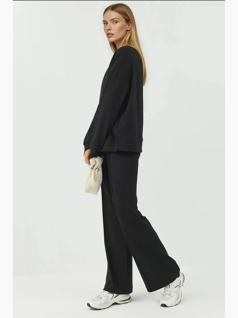 Pantalones texturizados de cintura alta y pierna ancha hiccup Negro - Kiabi