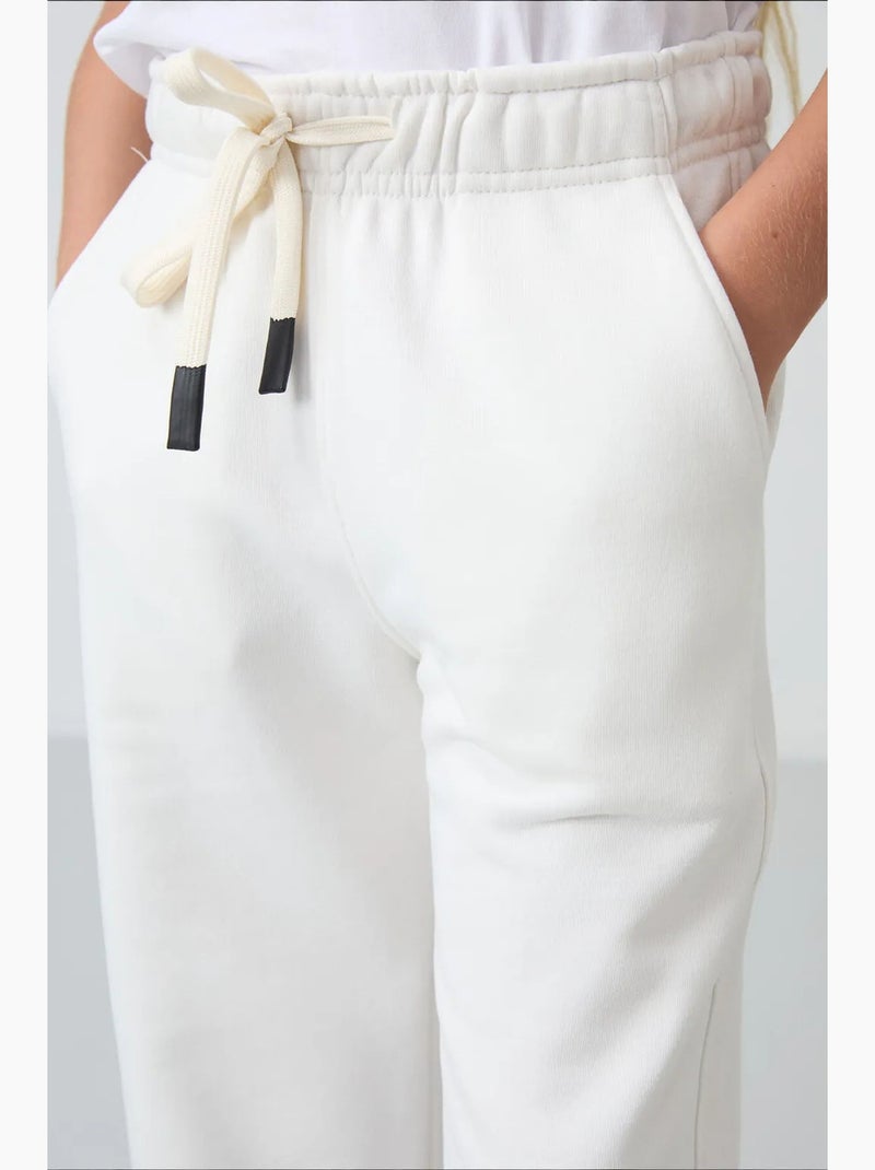 Pantalones youth de algodón y poliéster tommy Blanco roto - Kiabi