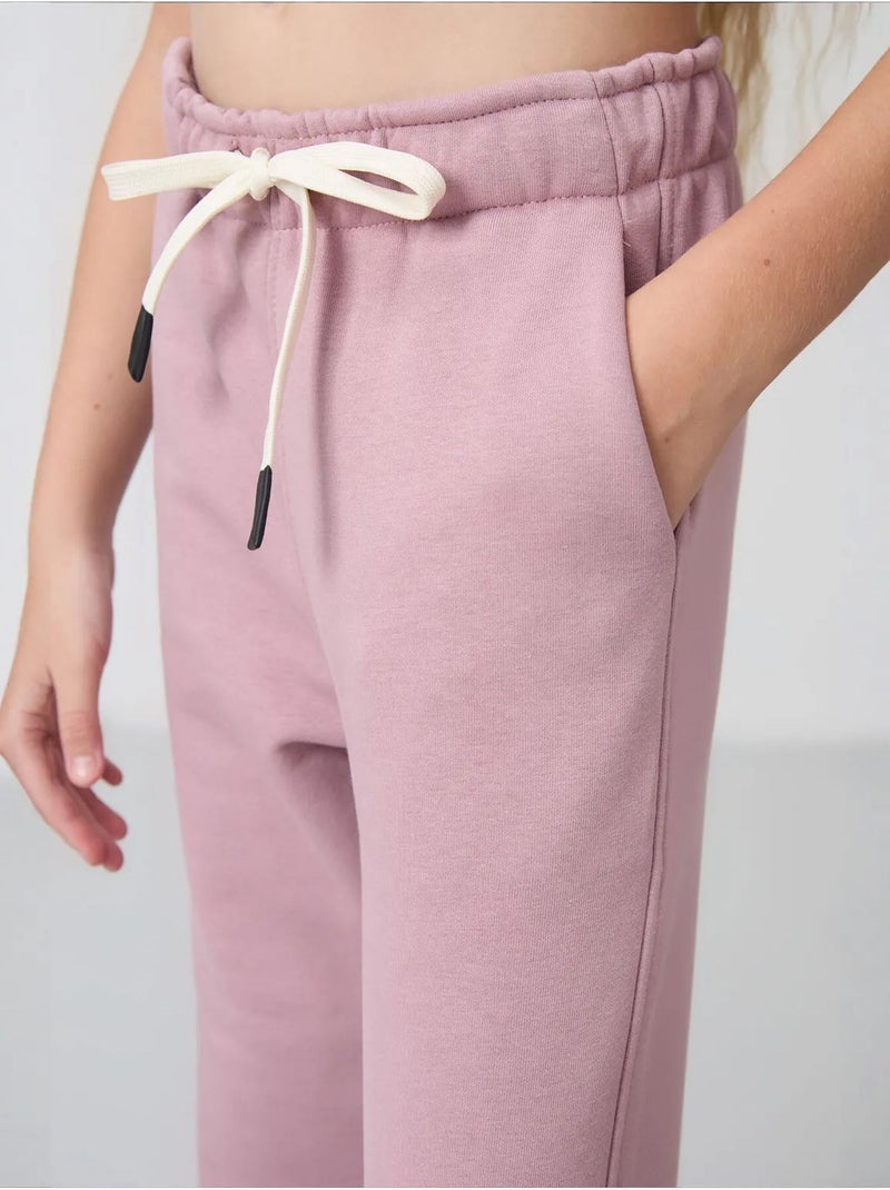 Pantalones youth de algodón y poliéster tommy Malva - Kiabi
