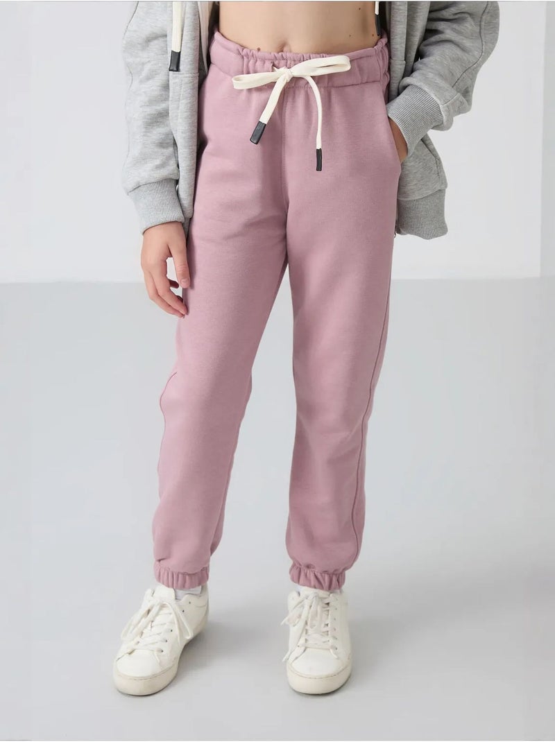 Pantalones youth de algodón y poliéster tommy Malva - Kiabi