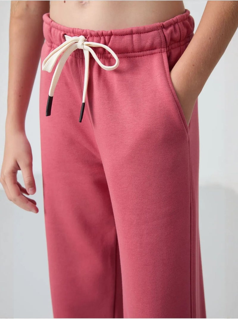 Pantalones youth de algodón y poliéster tommy Rosa viejo - Kiabi