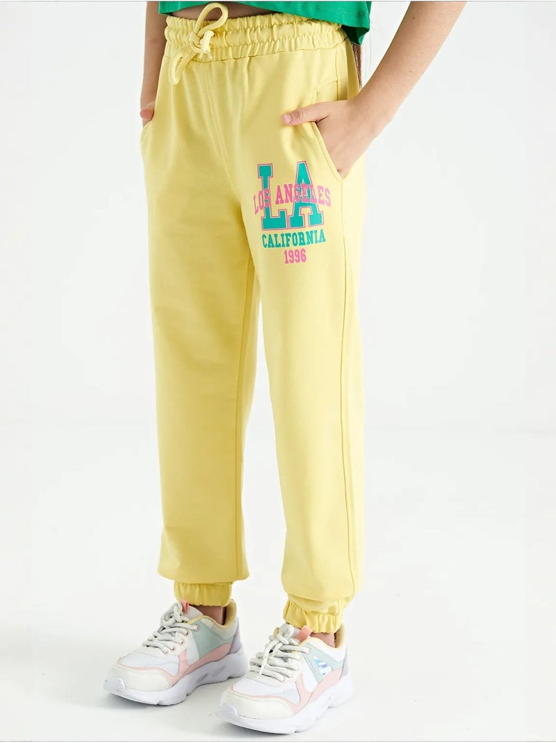 Pantalones youth de mezcla de algodón tommy Amarillo limón - Kiabi