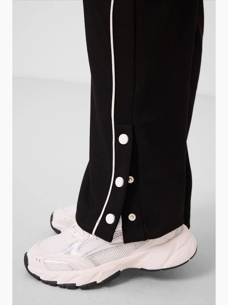 Pantalones youth unisex de algodón y poliéster tommy Negro - Kiabi