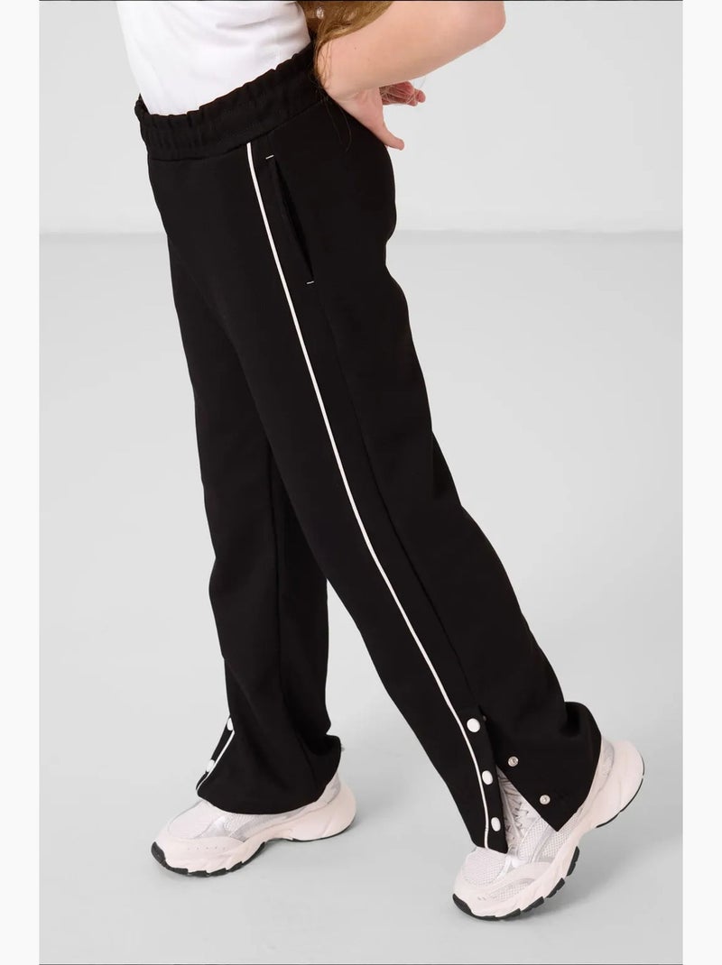 Pantalones youth unisex de algodón y poliéster tommy Negro - Kiabi
