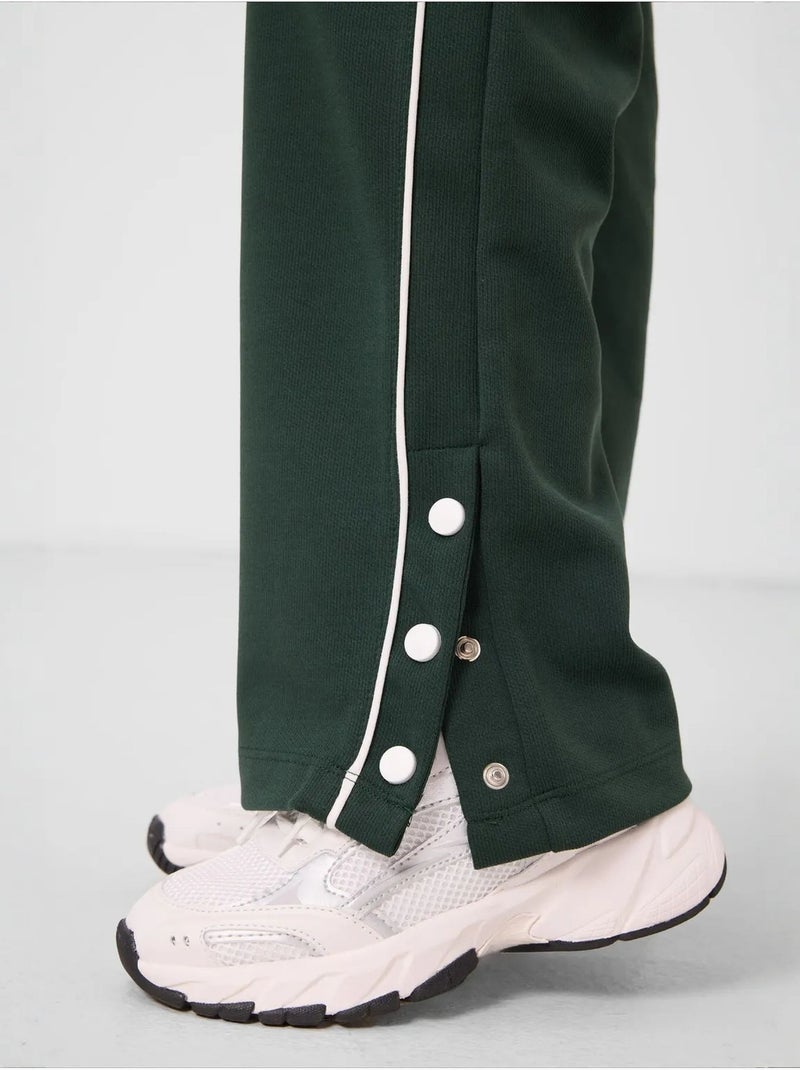 Pantalones youth unisex de algodón y poliéster tommy Verde oscuro - Kiabi