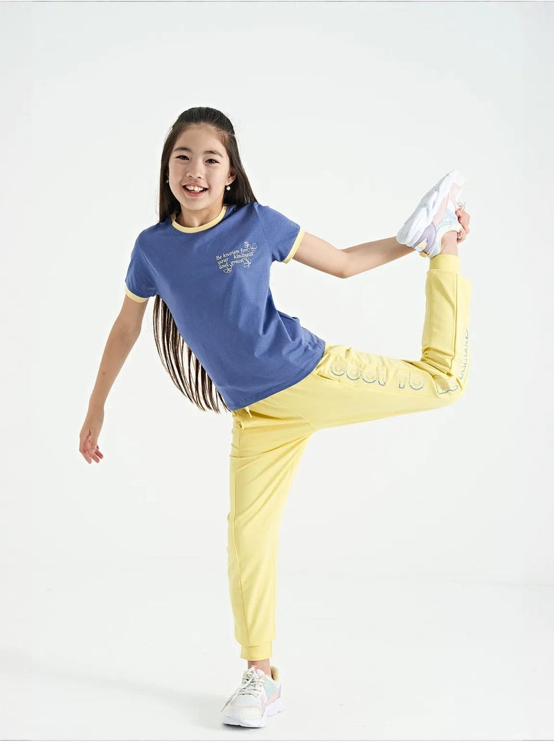 Pantalones youth unisex de mezcla de algodón tommy Amarillo limón - Kiabi
