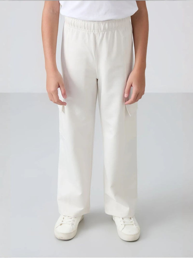 Pantalones youth unisex de mezcla de algodón tommy Blanco roto - Kiabi