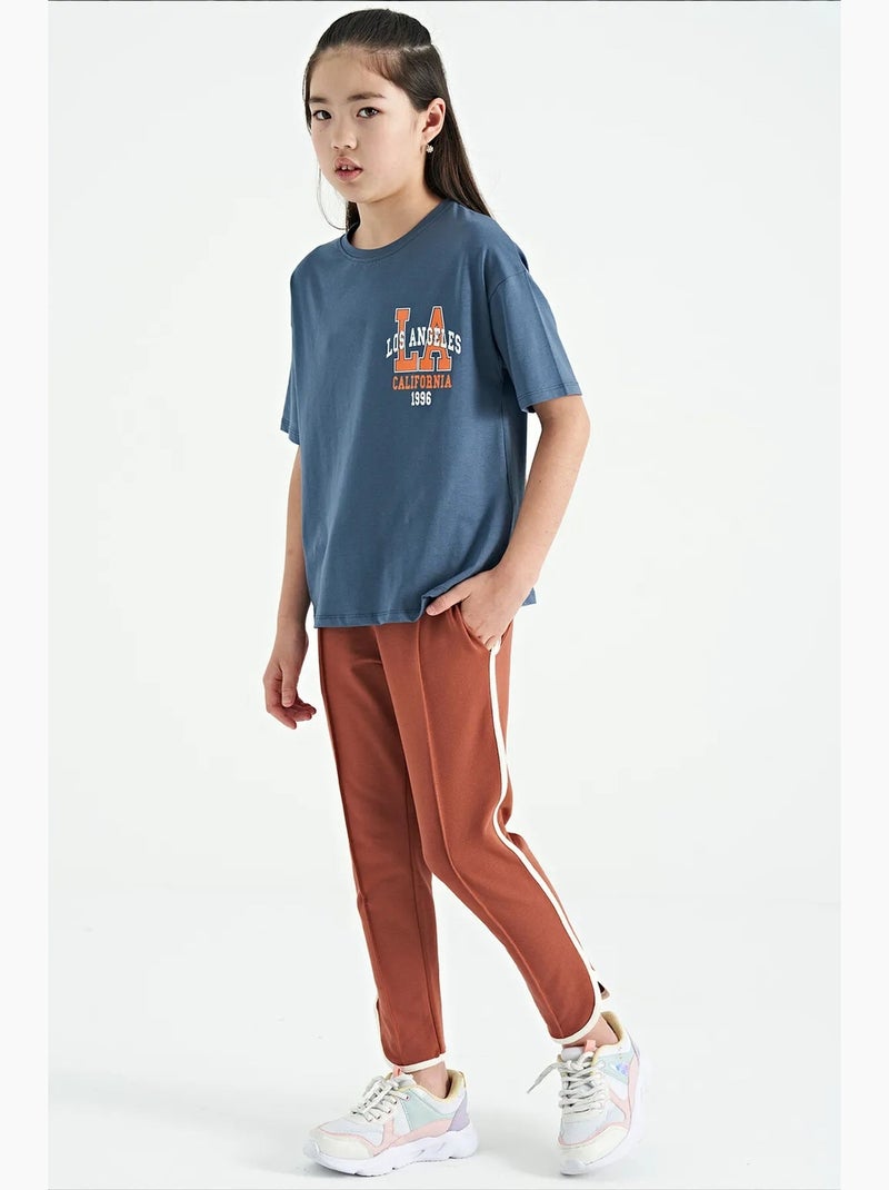 Pantalones youth unisex de mezcla de algodón tommy Terracota - Kiabi