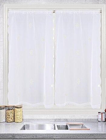 Par de cortinas blancas con motivo de copos de nieve