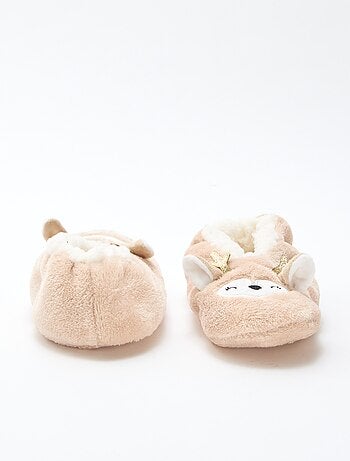 Par de zapatillas forradas con diseño fantasía