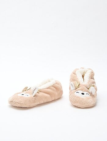 Par de zapatillas forradas con diseño fantasía