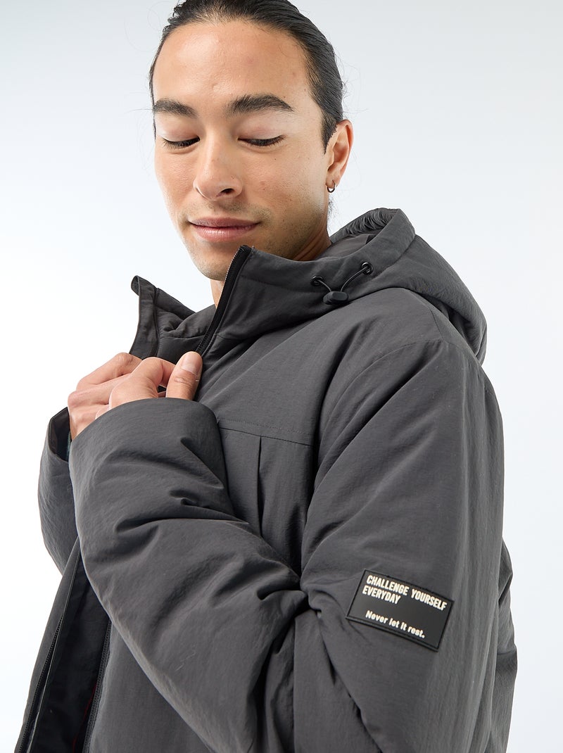 Parka ligera con capucha repelente al agua Negro - Kiabi