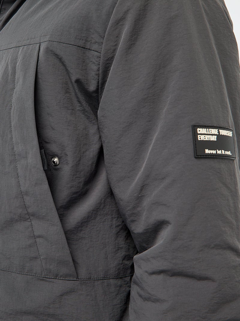 Parka ligera con capucha repelente al agua Negro - Kiabi