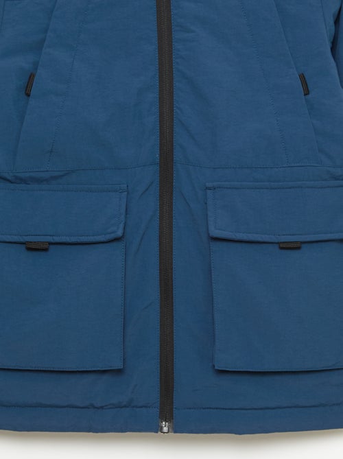 Parka ligera con capucha y 2 bolsillos fuelle con solapa - Kiabi