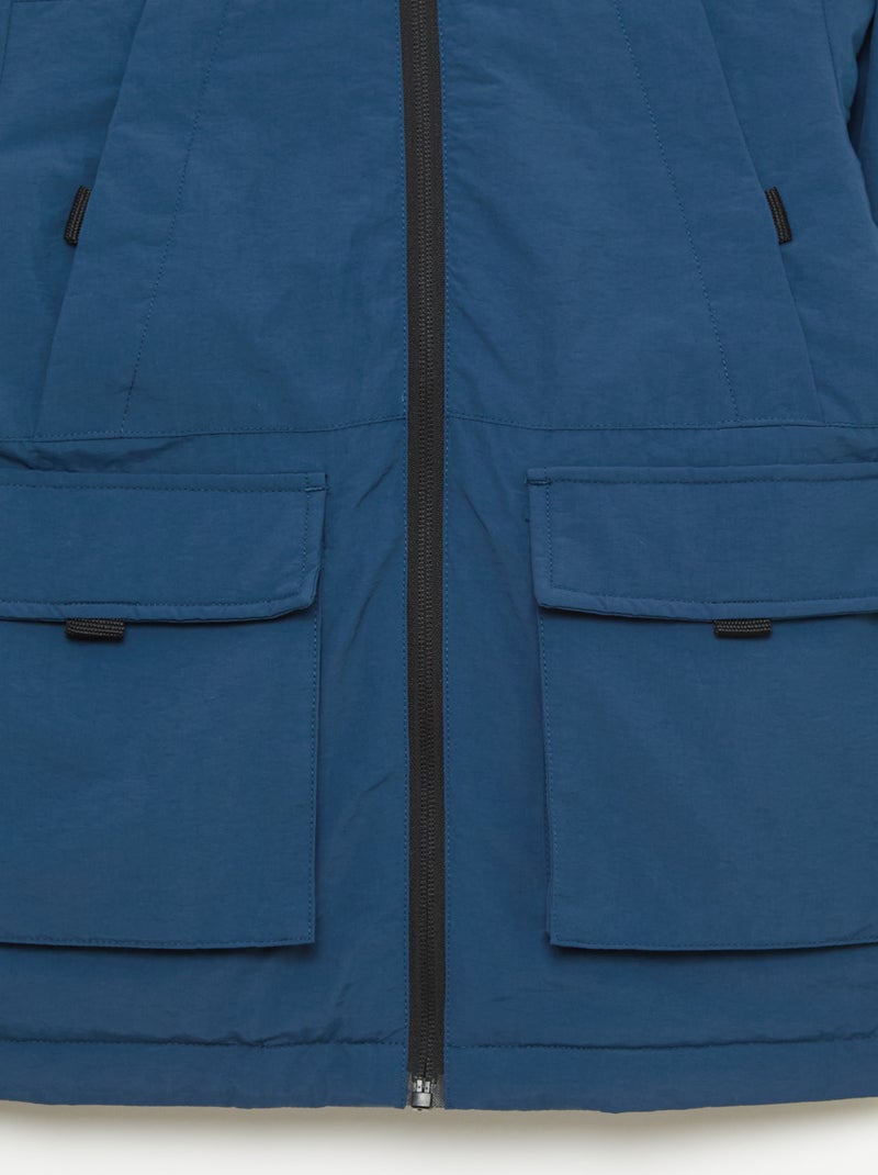Parka ligera con capucha y 2 bolsillos fuelle con solapa Azul - Kiabi