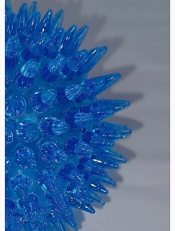 Pelota de juguete con granos para animales