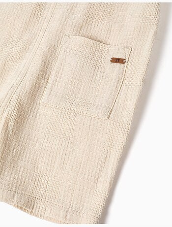 Peto de algodón dobby con bolsillos