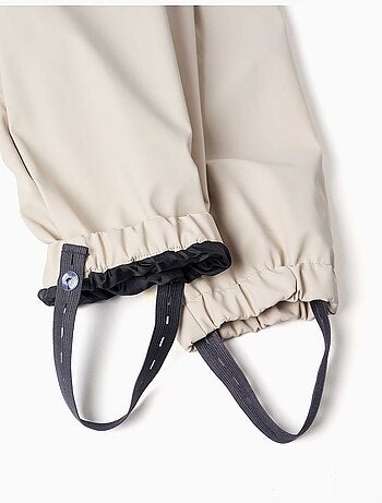 Peto para lluvia con tirantes ajustables