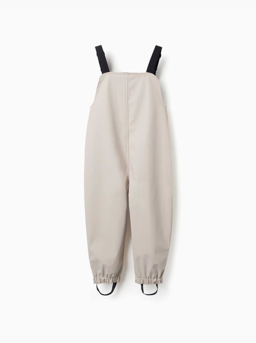 Peto para lluvia con tirantes ajustables - Kiabi Peto para lluvia con tirantes ajustables - Kiabi