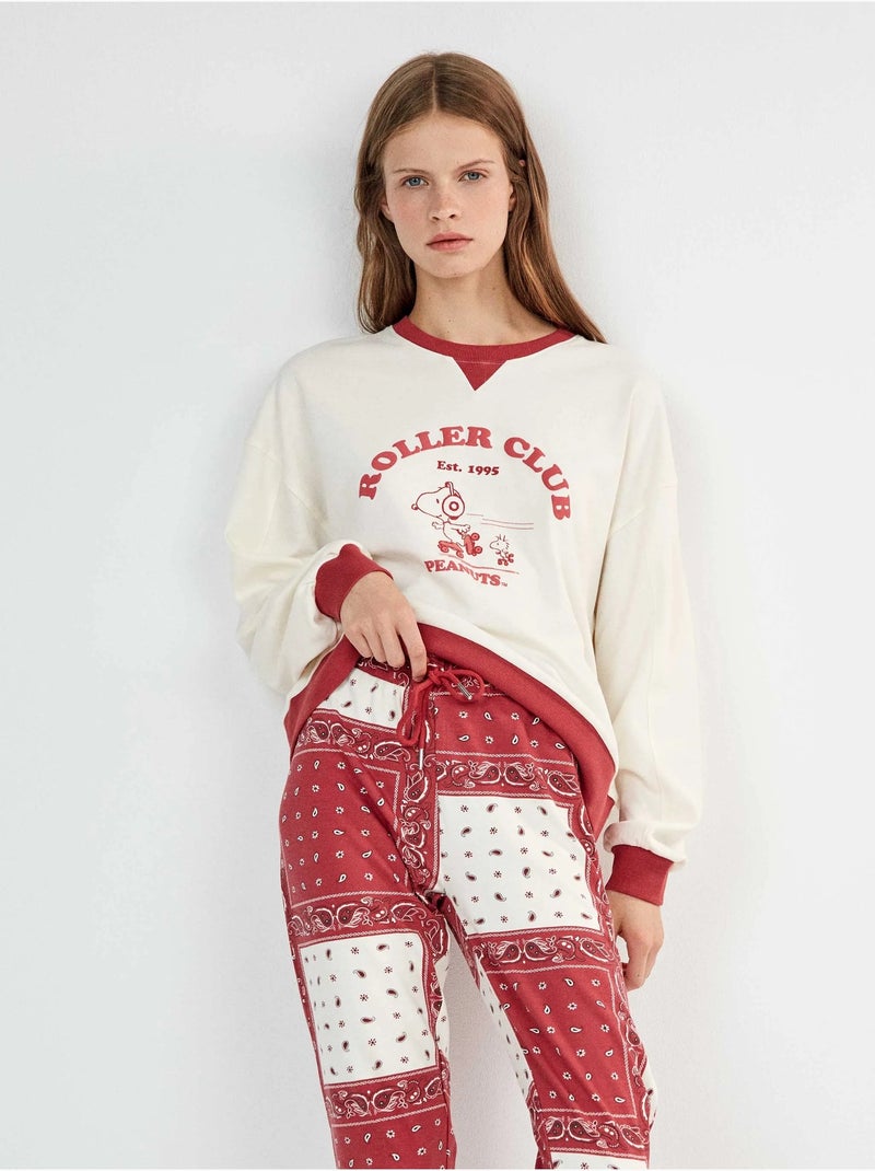 Pijama de snoopy con pantalón estampado paisley Crudo - Kiabi