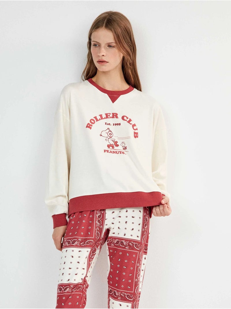 Pijama de snoopy con pantalón estampado paisley Crudo - Kiabi
