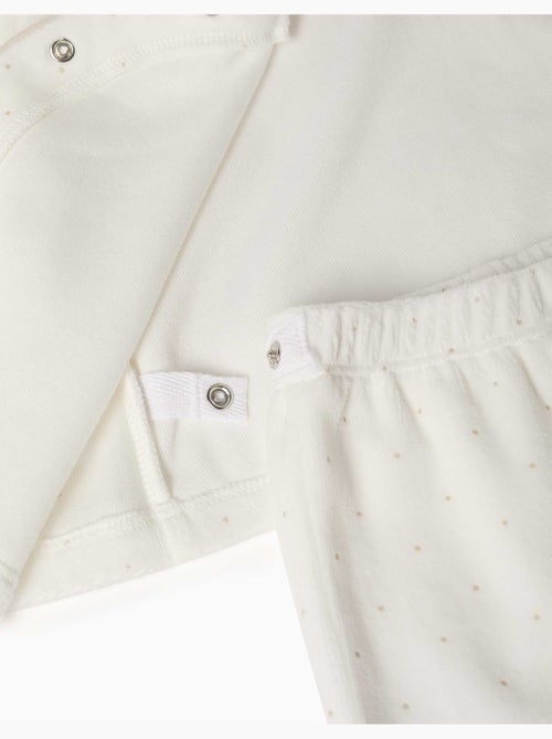 Pijama de terciopelo con estampado de lunares - Kiabi Pijama de terciopelo con estampado de lunares - Kiabi