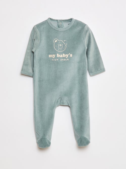 Pijama de terciopelo con pies y dibujo delantero - Kiabi Pijama de terciopelo con pies y dibujo delantero - Kiabi