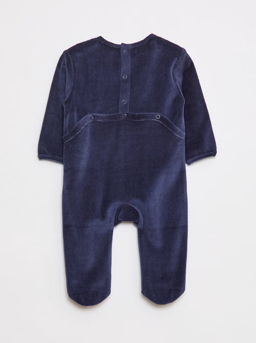 Pijama de terciopelo con pies y dibujo en la parte delantera - Kiabi Pijama de terciopelo con pies y dibujo en la parte delantera - Kiabi