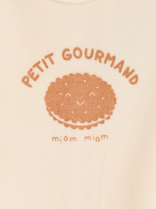 Pijama de terciopelo con pies y dibujo en la parte delantera - Kiabi Pijama de terciopelo con pies y dibujo en la parte delantera - Kiabi