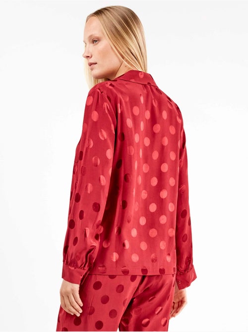 Pijama largo camisero de lunares en suave tejido de satén - Kiabi Pijama largo camisero de lunares en suave tejido de satén - Kiabi